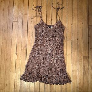 Snakeskin pattern rouched and ruffled express mini dress